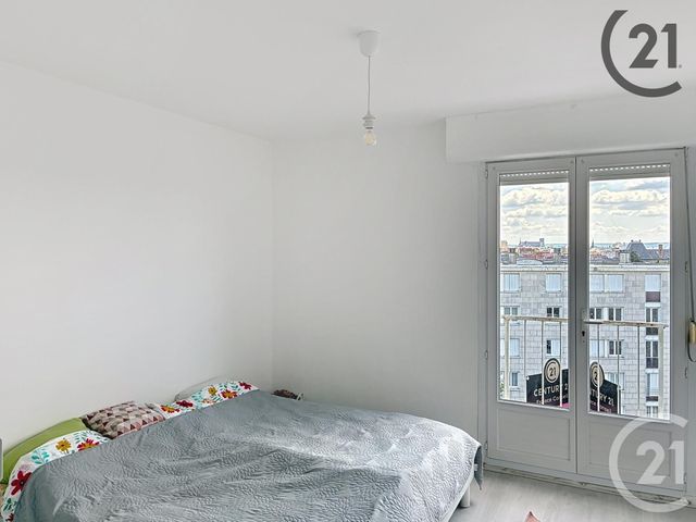 Afficher la photo en grand Appartement F4 à vendre - 4 pièces - 74.0 m2 - REIMS - 51 - CHAMPAGNE-ARDENNE - Century 21 Espace Conseil